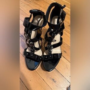 Strap buckle heels